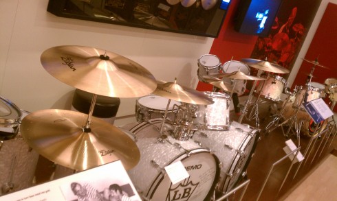 A double-kick kit used by Louis Bellson, and next to that a kit used by Keith Harris (Black Eyed Peas).